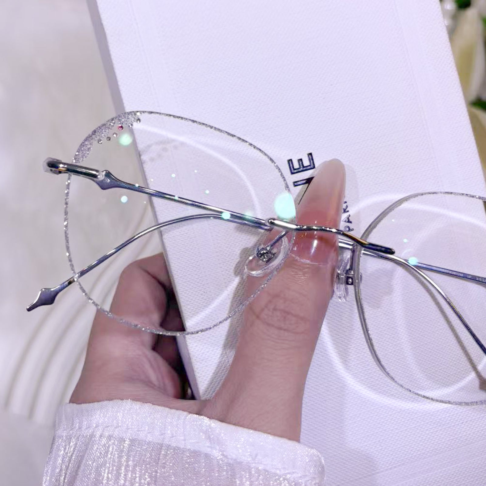 Stella Geometric Silver Rimless Eyeglasses For Women | LensAlter